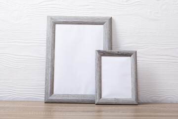 Composition of white cards in frames with copy space on white background