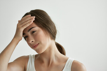 Fototapeta premium woman holding her head migraine health problems depression dissatisfaction