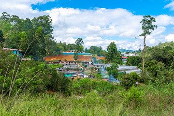 Poor dilapidated houses of the inhabitants of the island of Sri Lanka. Jungle lodging
