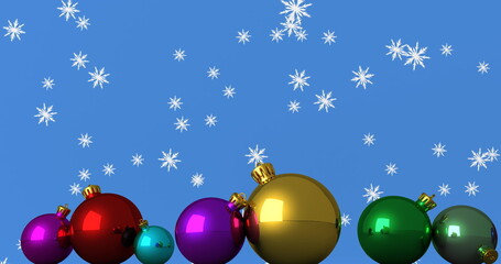Digital image of snowflakes falling over multiple colorful christmas baubles
