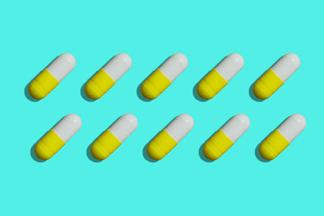 pills capsules pattern on bright background