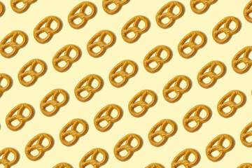 cookies pretzels pattern on yellow background