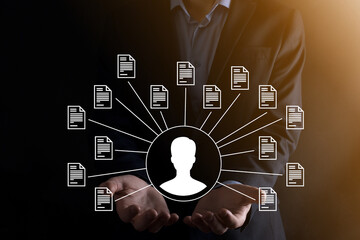 Document Management System DMS .Businessman hold user and document icon.Software for archiving, searching and managing corporate files and information.Internet Technology Concept.Digital security.