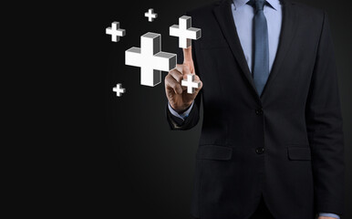 Businessman hold 3D plus icon, man hold in hand offer positive thing such as profit, benefits, development, CSR represented by plus sign.The hand shows the plus sign