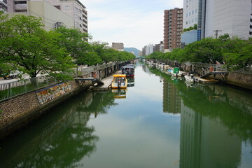 Fototapeta na wymiar Kagami-gawa River View and City of Kochi in Kochi, Japan - 日本 高知県 鏡川