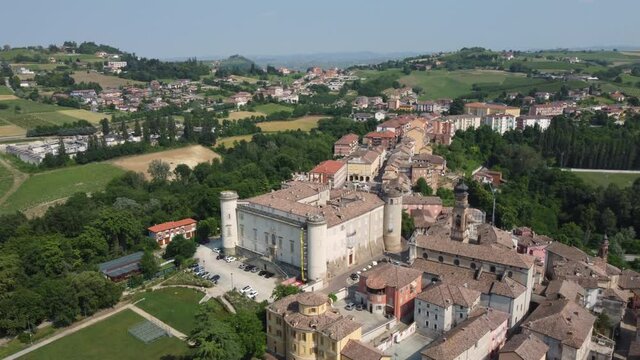 Costigliole D'Asti town and castle aerial view in Langhe, Roero, and Monferrato in Piedmont (Piemonte), Northern Italy. Famous Italian tourism destination Europe. Unesco World Heritage site. Vineyards