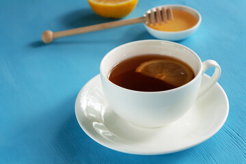 .Herbal tea with honey and lemon on cinemphone healthy food concept. Minimalistic flat lay. horizontal orientation
