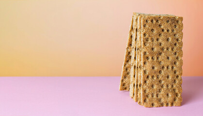 Rye crispbread. Diet breakfast on a bright background.