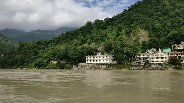 Green hills in the rainy season. View from the other side of the river to the Trimbakeshwar temple. Rishikesh India circular panorama.