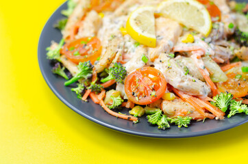 Piri piri style chicken on a bed of wholewheat pasta and vegetables, with a cool sour cream and chive dressing