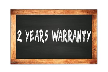 2  YEARS  WARRANTY text written on wooden frame school blackboard.