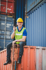 foreman or engineer are work in container shipping industry warehouse, logistic transport to import...