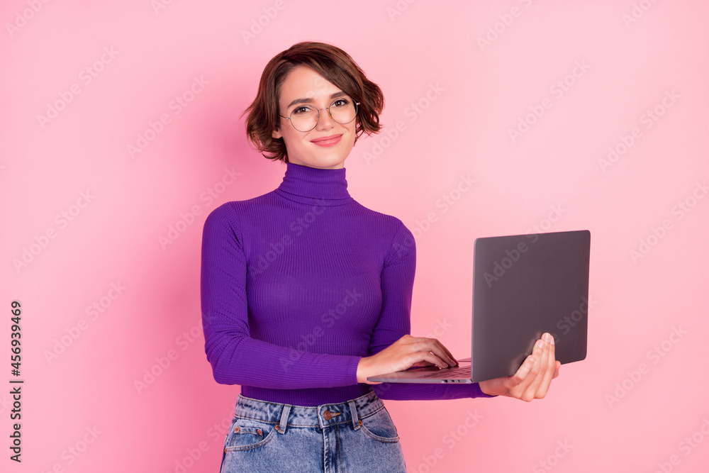 Sticker Photo of nice brunette millennial lady type laptop wear violet turtleneck eyewear isolated on pink background