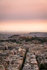 Fototapeta na wymiar High angle view of Acropolis and Athens city in Greece at sunset from the Lycabettus Hill