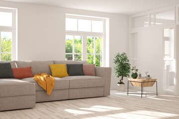 Minimalist living room in white color with sofa and summer landscape in window. Scandinavian interior design. 3D illustration