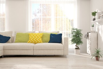 Stylish room in white color with sofa and autumn landscape in window. Scandinavian interior design. 3D illustration