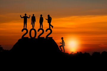 new year 2022 with business people silhouette