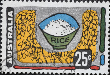 AUSTRALIA-CIRCA 1972 : A post stamp printed in Australia showing a rice bowl with rice for the...