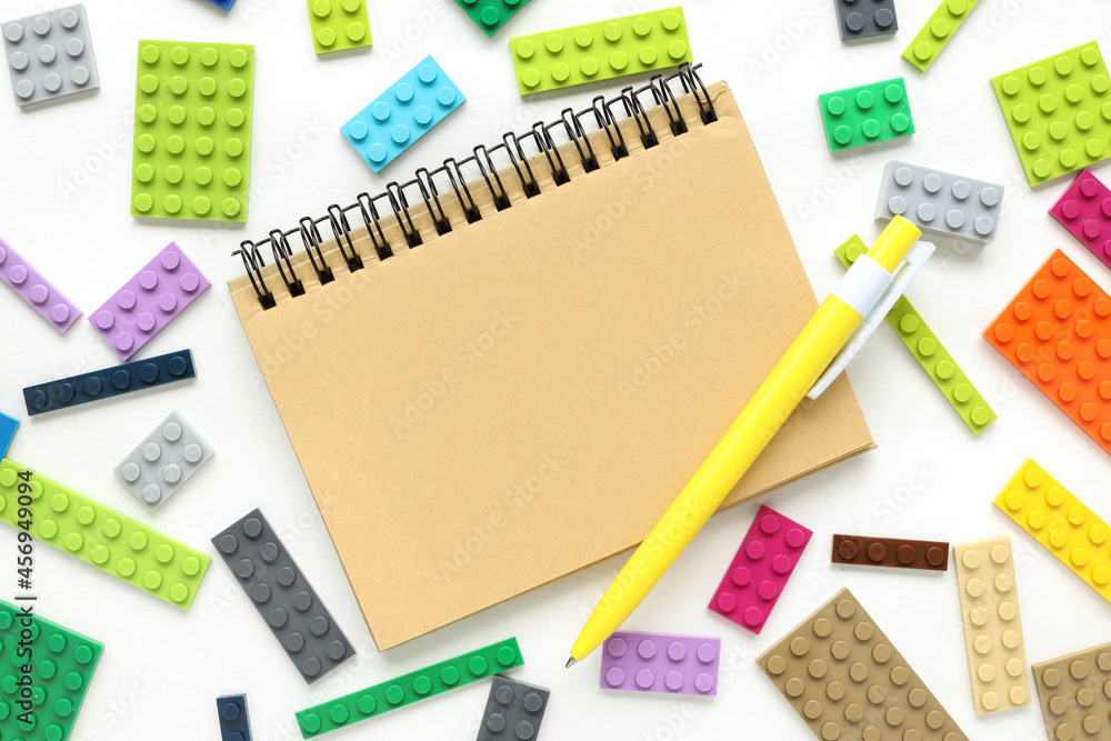 Aufkleber notepad on a white background. developmental constructor conceptual background and place for text. i
