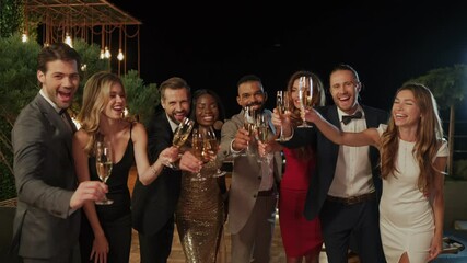 Group of people toasting with champagne and spending time on party 