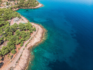 Drone shot on boat trips to the nearby Paklinsky Islands. Secluded beaches and coves in Croatian island of Hvar. Dubovitsa, and lavender fields frame from drone. Drone shot on Croatian island - obrazy, fototapety, plakaty
