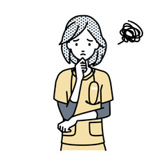 立って手をあごにあてて困っている看護師の女性
