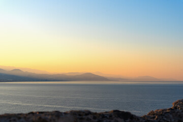 Mountain panoramic landscape with silhouettes of mountains at sunrise in Alanya.