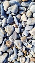 Small stone texture for background. High quality photo. High quality photo