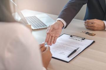 Close up hand of tenant, client sign signature contract rental, purchase, buyer home or apartment with landlord, realtor after banker agreement mortgage, loan success or done. Property agent concept.