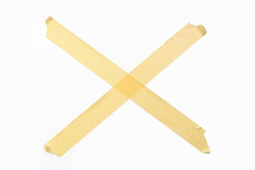 Large X or cross out made of adhesive tape on white background, with cliping path