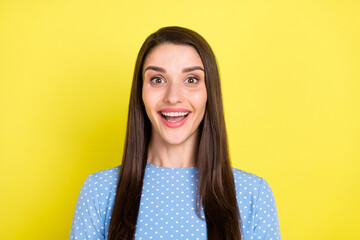 Fototapeta premium Photo of funny impressed young woman dressed blue clothes big eyes open mouth smiling isolated yellow color background