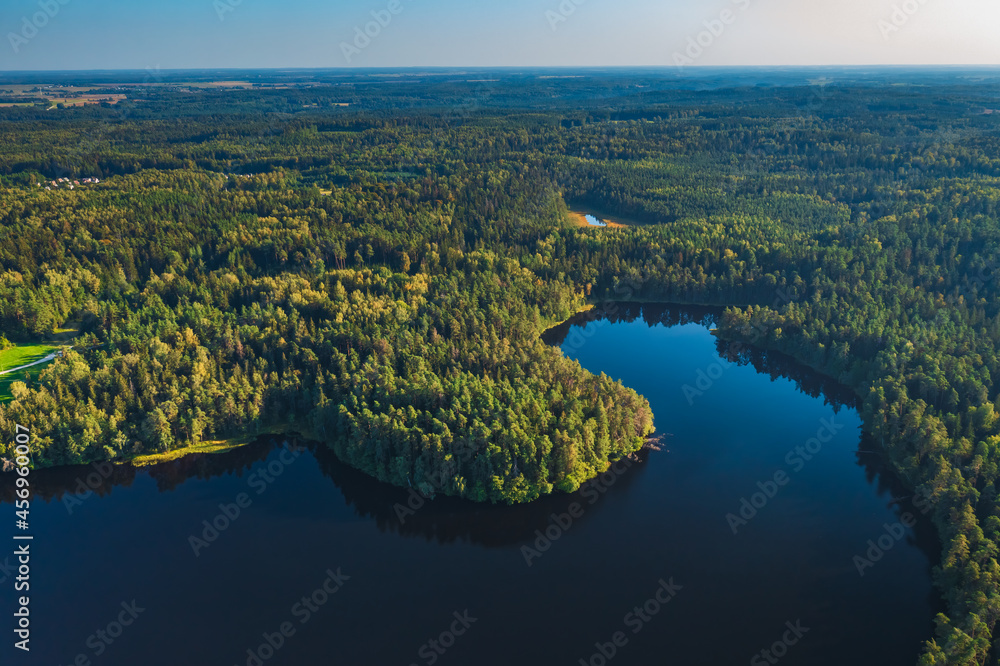 Wall mural aerial view of wild forest lake in lithuania