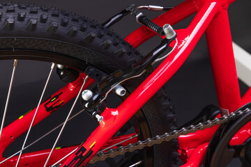 Fototapeta na wymiar Sport mountain red bicycle isolated on black background.