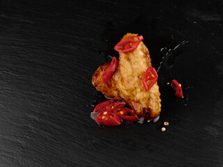 Spicy chicken wing with red chili