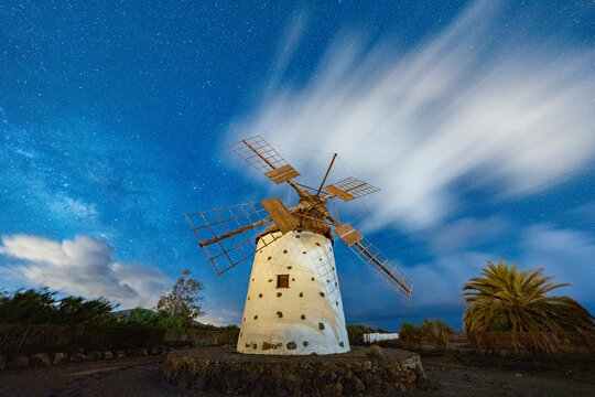 Milky Way glowing over the stone windmill, El Cotillo, La Oliva, Fuerteventura, Canary Islands