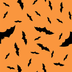 Scary black bats are flocking, isolated on an orange Halloween vector background. Illustration of nocturnal creatures-bats. Silhouettes of bats are traditional Halloween symbols on a colored