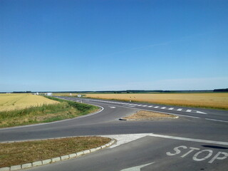 Empty junction with safety markings on the road