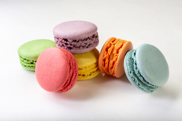 French macaroni. the most delicate cake is a cookie made of two smooth halves, fastened with stringy fillings.French pastry made from egg whites. French macaroni in different colors.