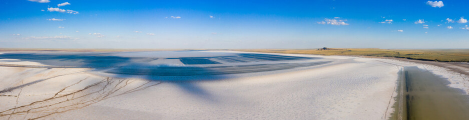 Fototapeta na wymiar Beautiful view, wildlife and industrial landscape at Salt lake Baskunchak, Astrakhan region Russia.