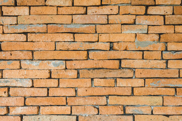 The textures of the orange brick blocks are arranged beautifully and neatly to be the wall