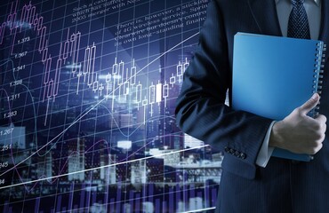 Thinking businessman standing and stock infographic on city background.