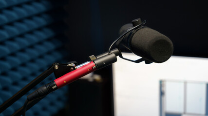 microphone in recording studio, close up, blurry background