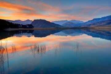 Fototapeta premium SUNSET REFLECTIONS IS MOUNTAIN LAKE. South Africa