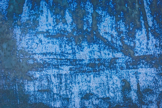 Old blue dirty concrete wall texture with abstract grunge pattern background