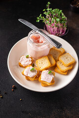 Smorrebrod seafood sandwich fish butter spread shrimp on bread capelin caviar taste fresh portion ready to eat meal snack copy space food background rustic 