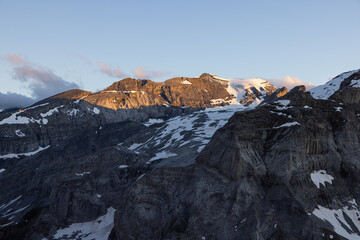 Amazing view to the peaks of the alps in Switzerland. Beautiful scenery in one of the most beautiful place in the world. Snow covered peaks and a blue sky.