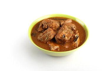 Indian home made spicey fish curry in bowl	
