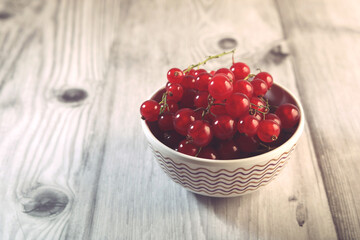 Fresh Red currant berries in bowl	
