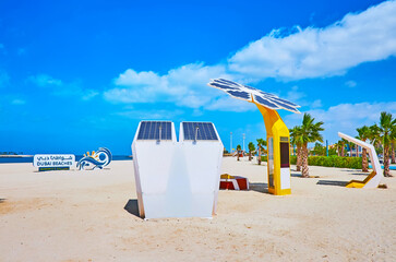 Solar powered chargers on Jumeirah beach, Dubai, UAE