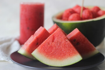 Fresh watermelon slices. Its good to keep your body cool from the summer heat. Shot along with water melon scoops and juice